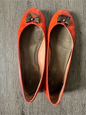 Anthropologie Orange Ballet Flats with Antique Bow Accent in size 7.5